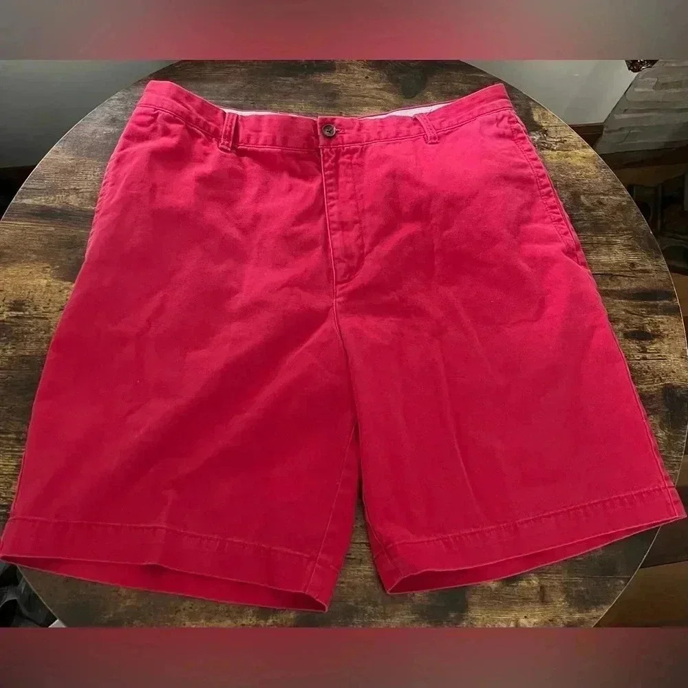 IZOD | men’s red flat front shorts. Size: 38​